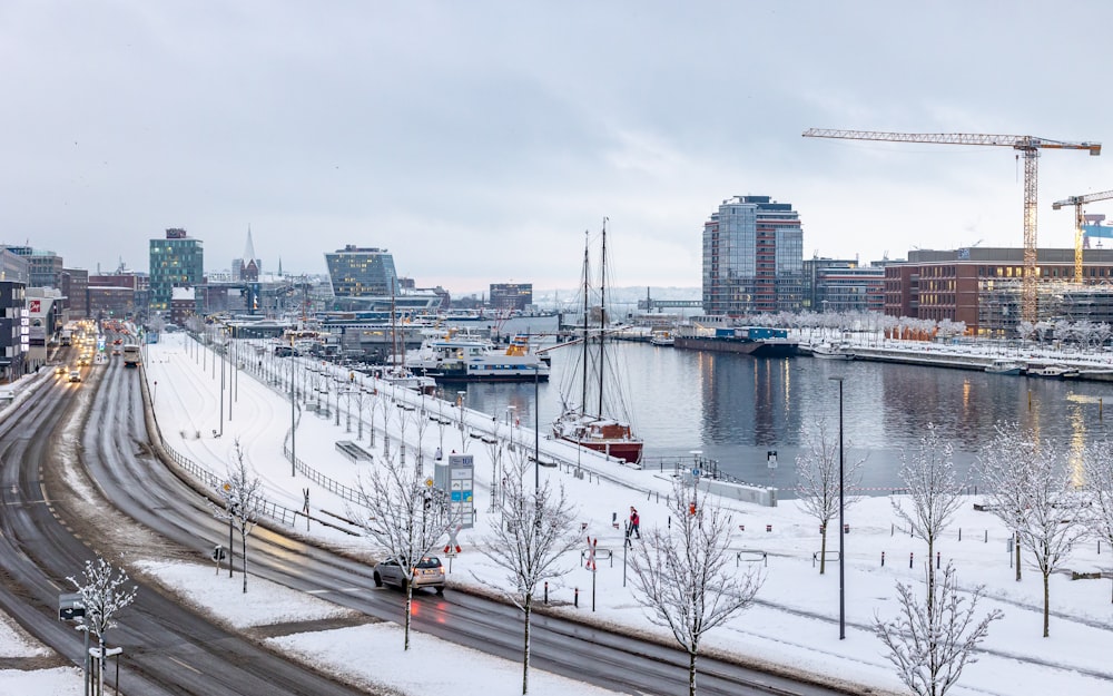 a view of a harbor with a lot of snow on the ground