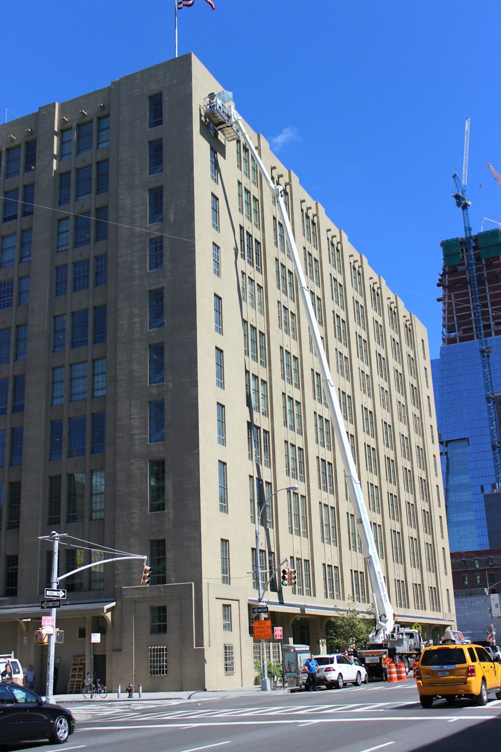 a tall building with a flag on top of it