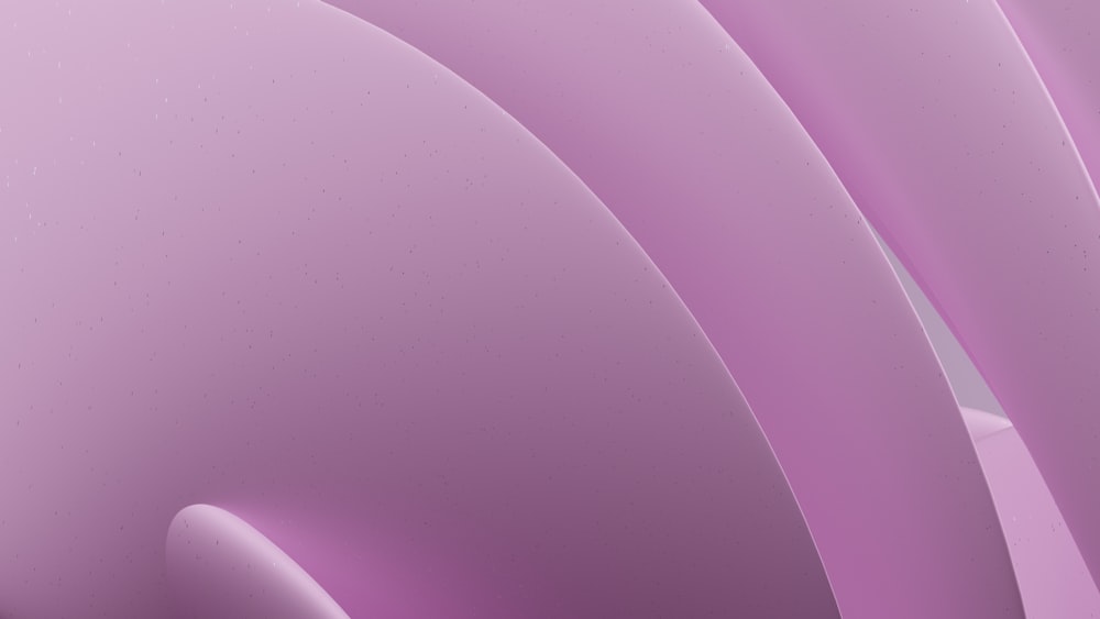 an abstract pink background with curved curves