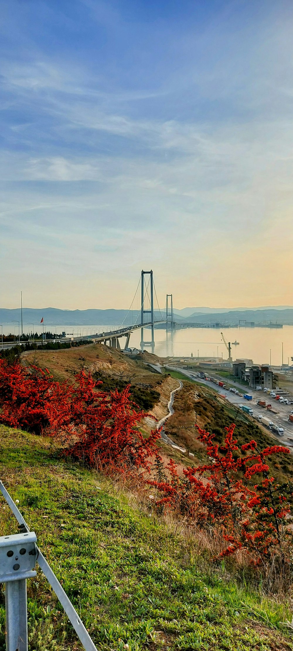 a view of a bridge over a body of water