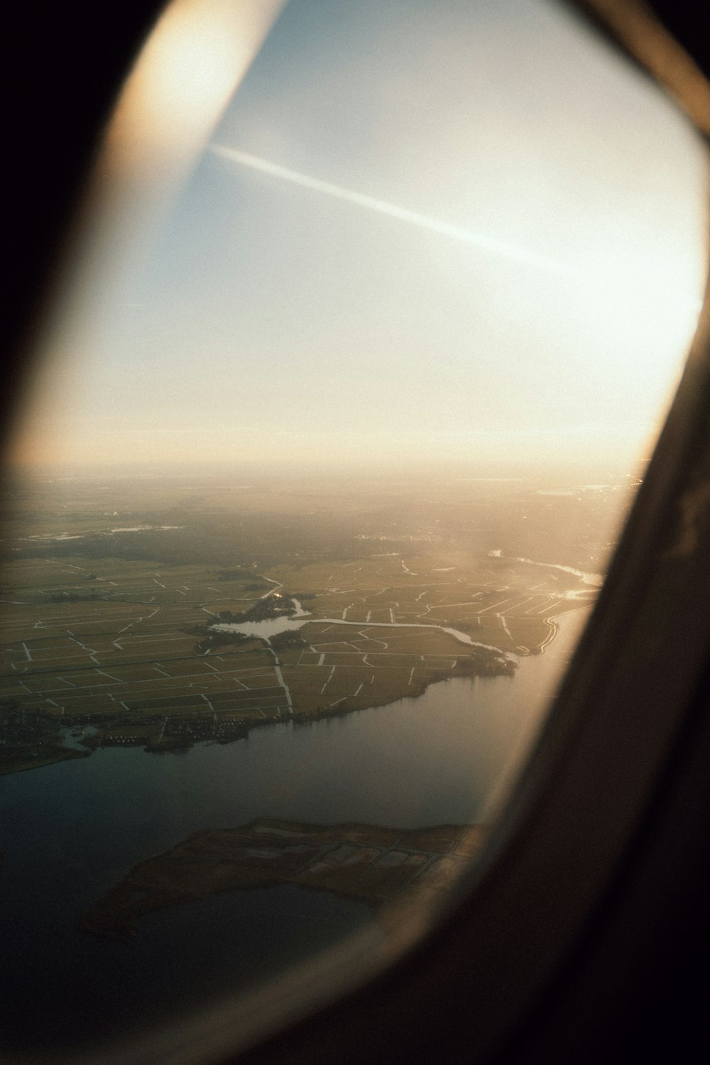 a view of a body of water from an airplane window