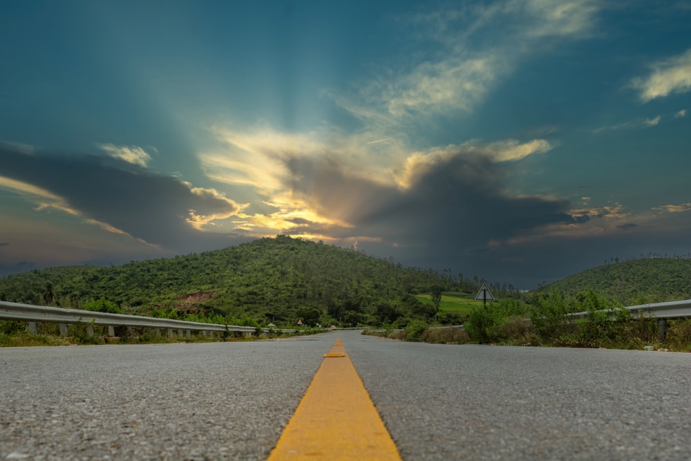 a road with a yellow line in the middle of it