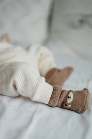 Cozy children's pajamas and underwear in soft pastel colors with cute, simple prints