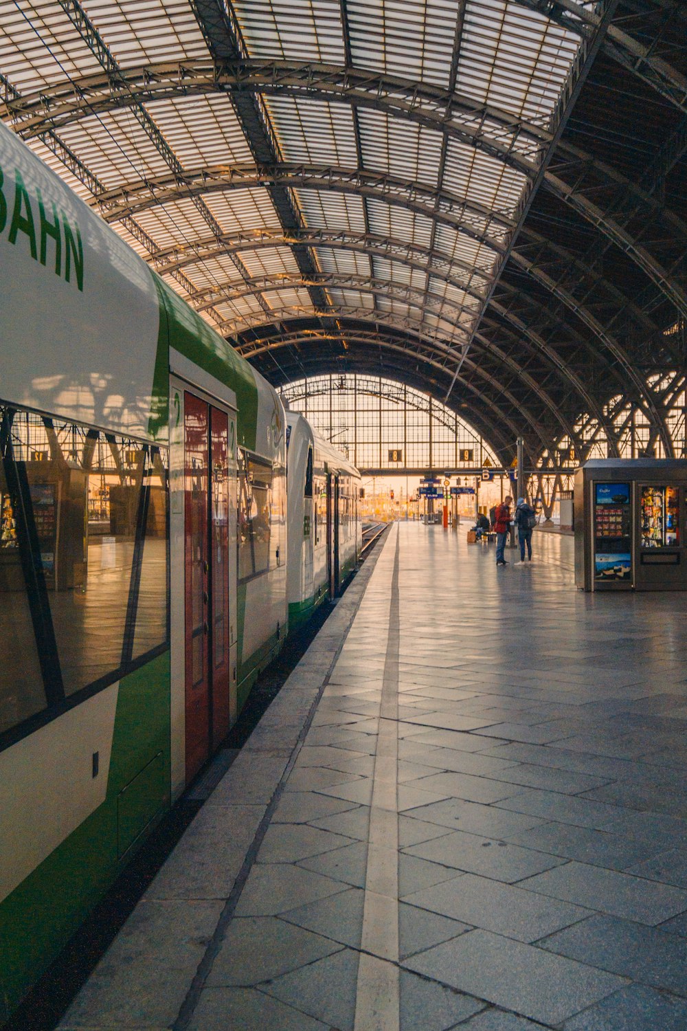 a train parked in a train station next to a platform