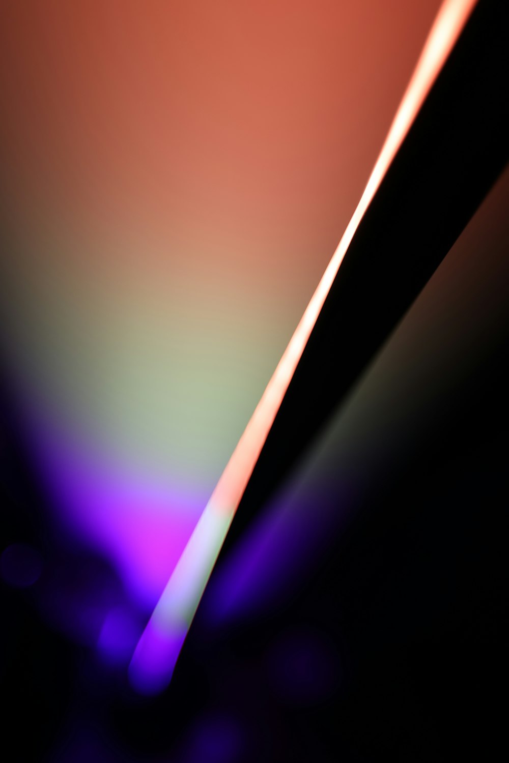 a close up of a cell phone with a blurry background