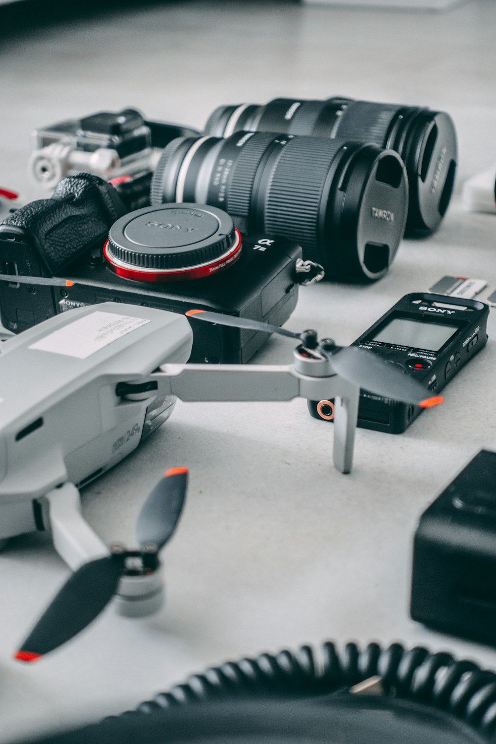 a bunch of different types of electronic devices on a table