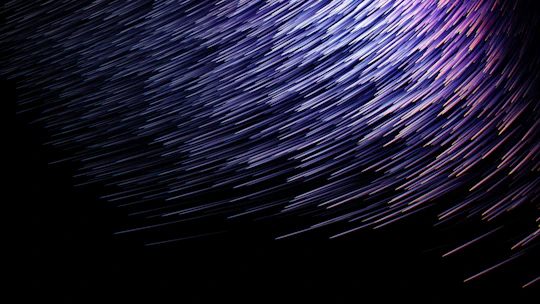 A vibrant burst of electric violet light streaking across a deep charcoal background, symbolizing creative energy.