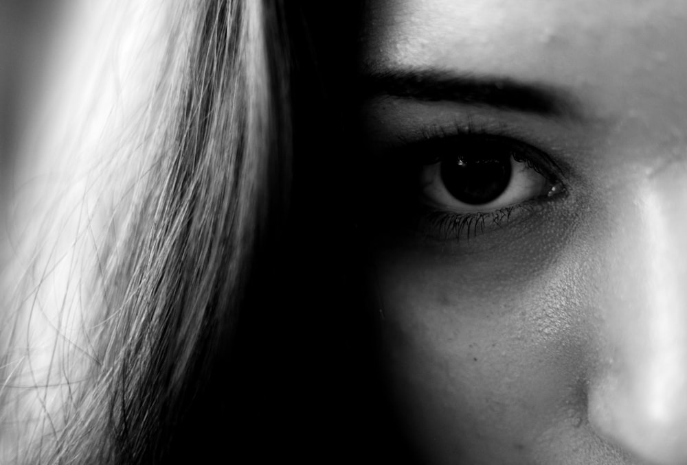 a black and white photo of a woman's face