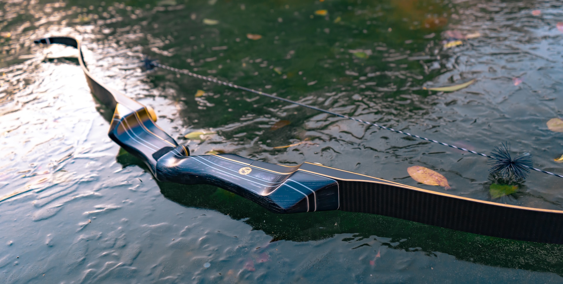 a long boat floating on top of a body of water