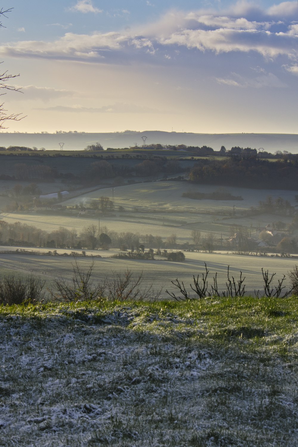 a view of the countryside from a hill