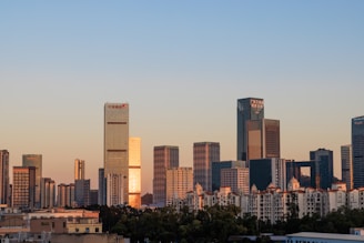 a view of a city with tall buildings