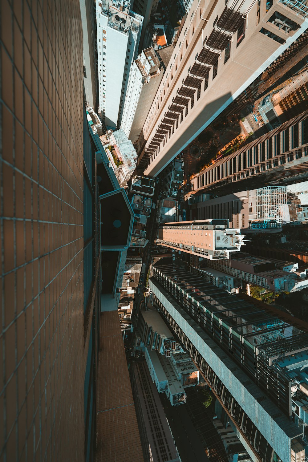 an aerial view of a city with tall buildings