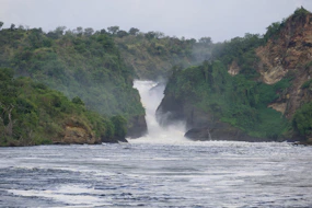 a river with a waterfall in the middle of it