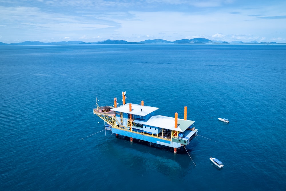 a boat floating on top of a large body of water