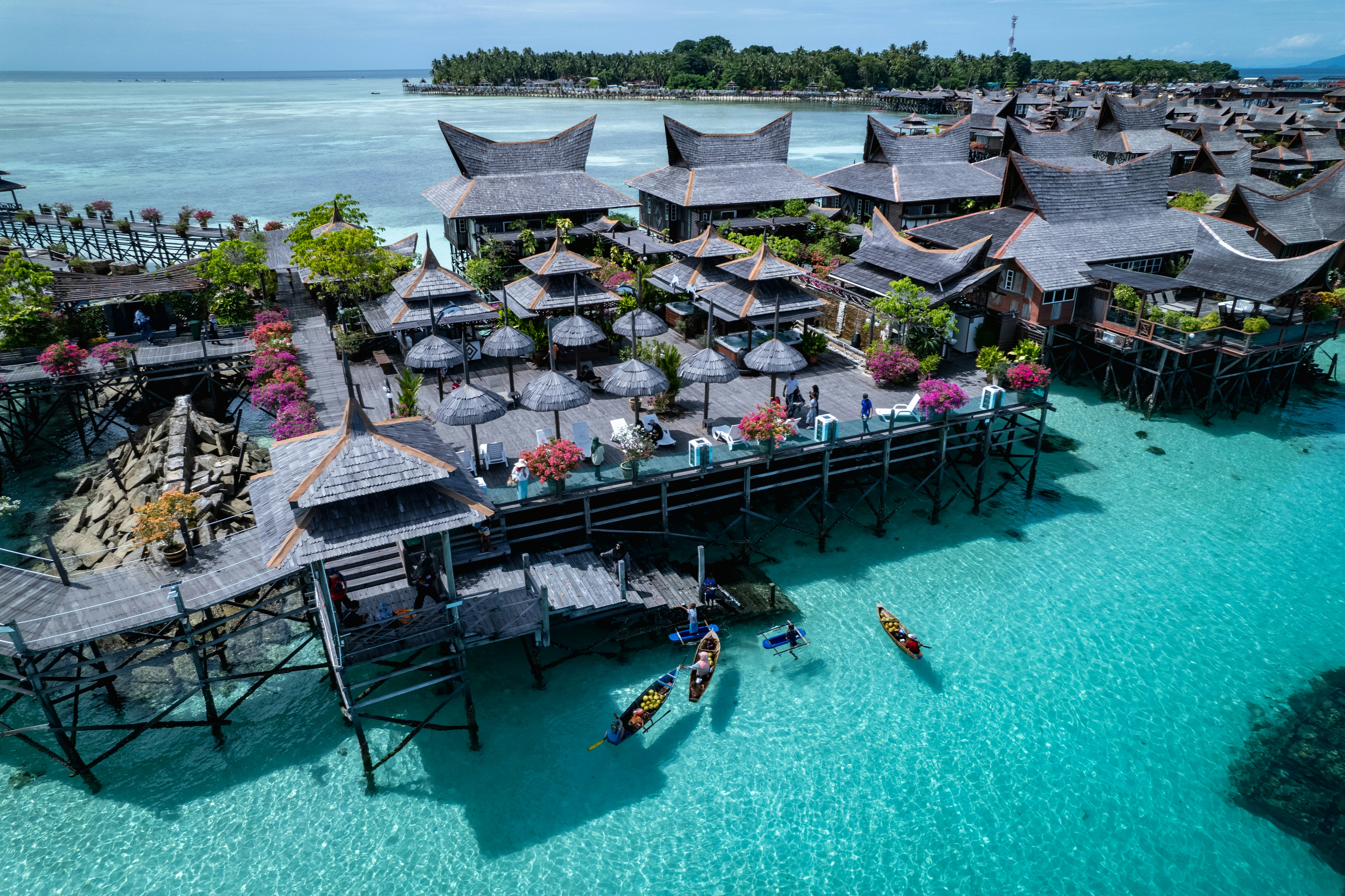 a group of people in kayaks on a body of water