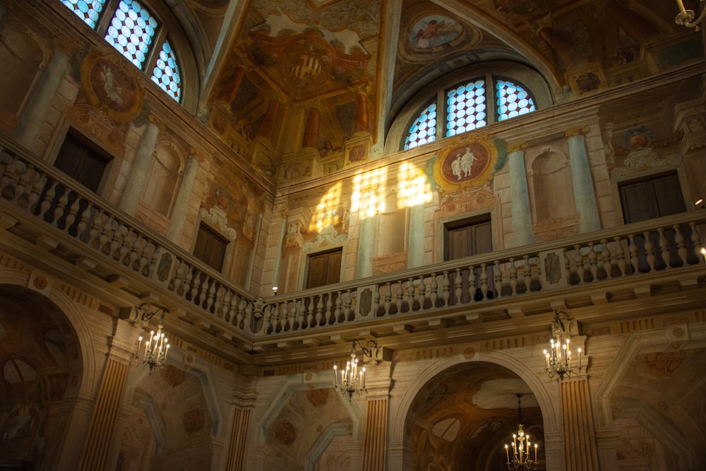 a large building with a lot of windows and chandeliers