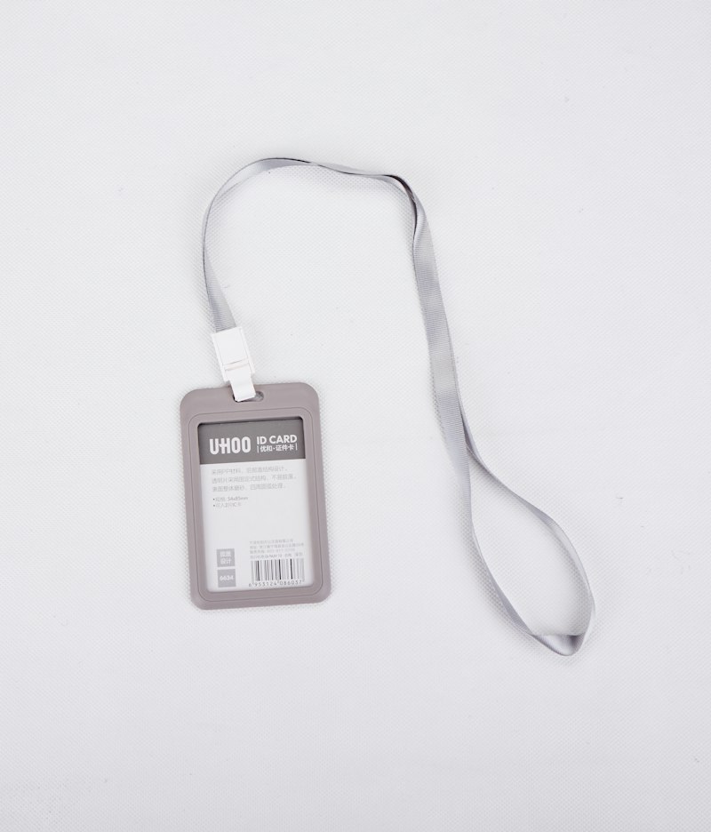 A staff ID card on a lanyard
