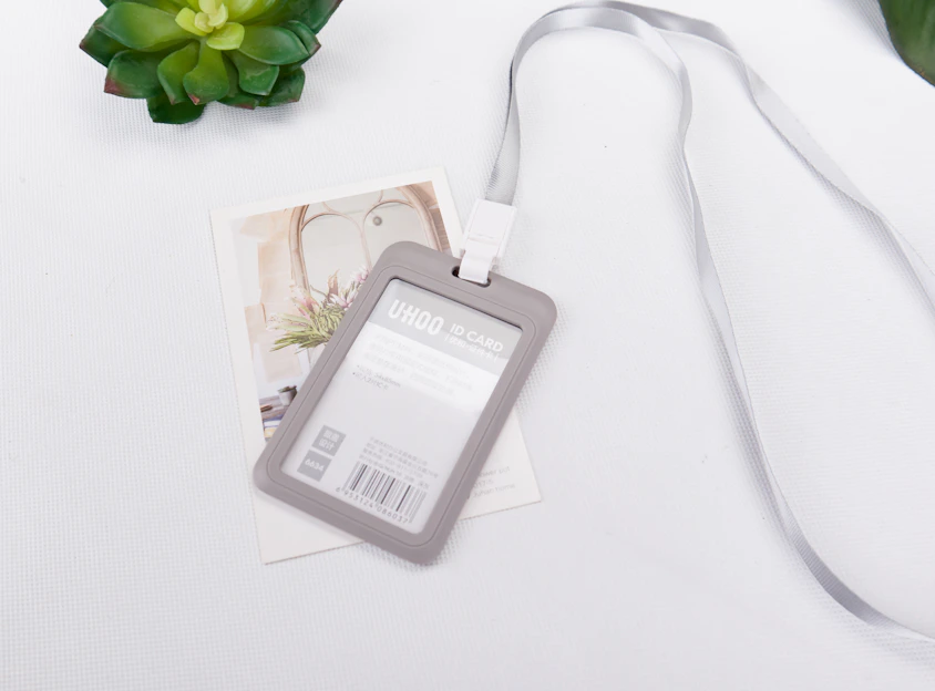 a luggage tag sitting on top of a white table