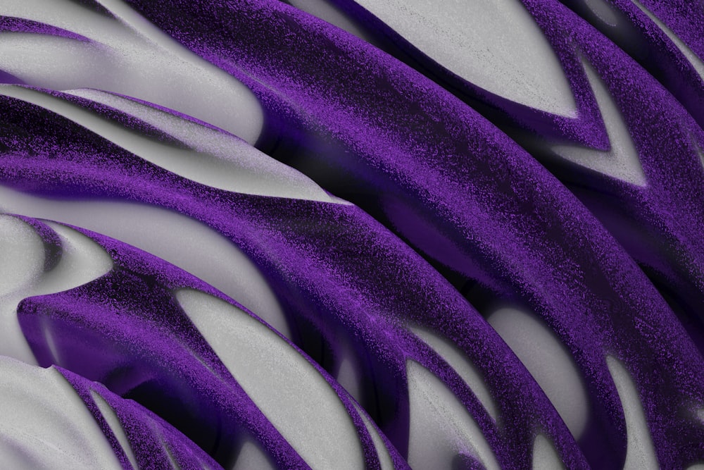 a close up of a purple and white object