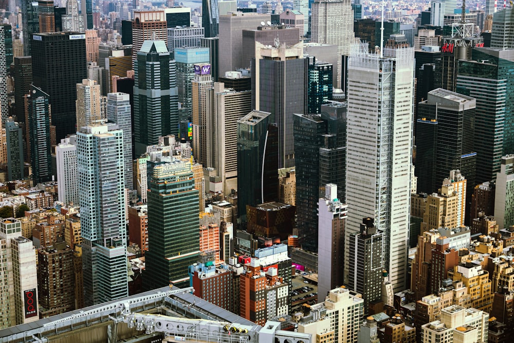 an aerial view of a city with tall buildings