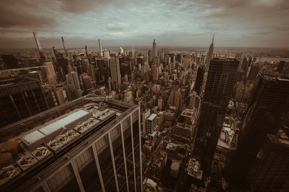 an aerial view of a city with tall buildings