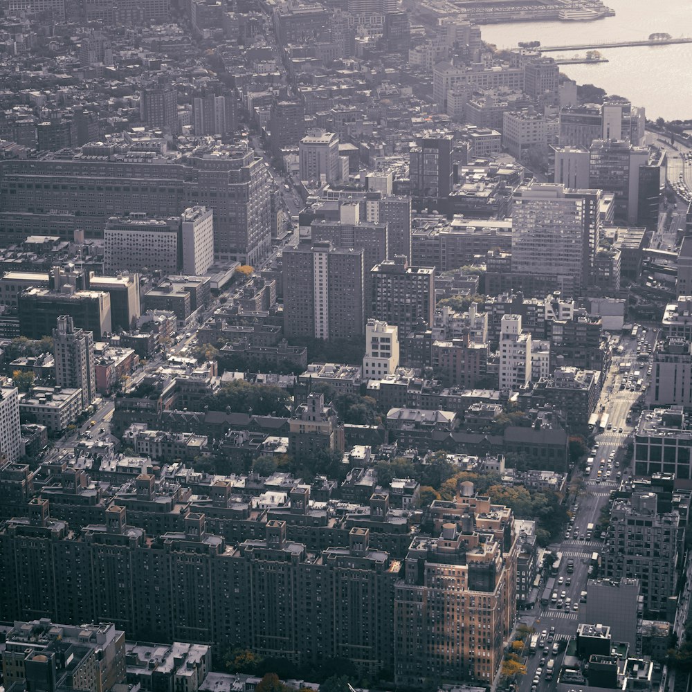 an aerial view of a city with lots of tall buildings