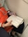 An adult enjoying a word search book from books by skb.