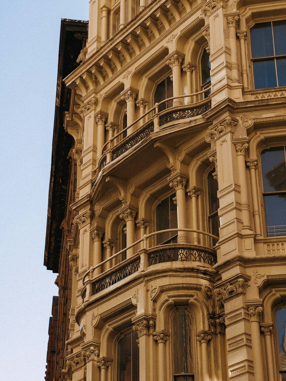 a tall building with a clock on the front of it