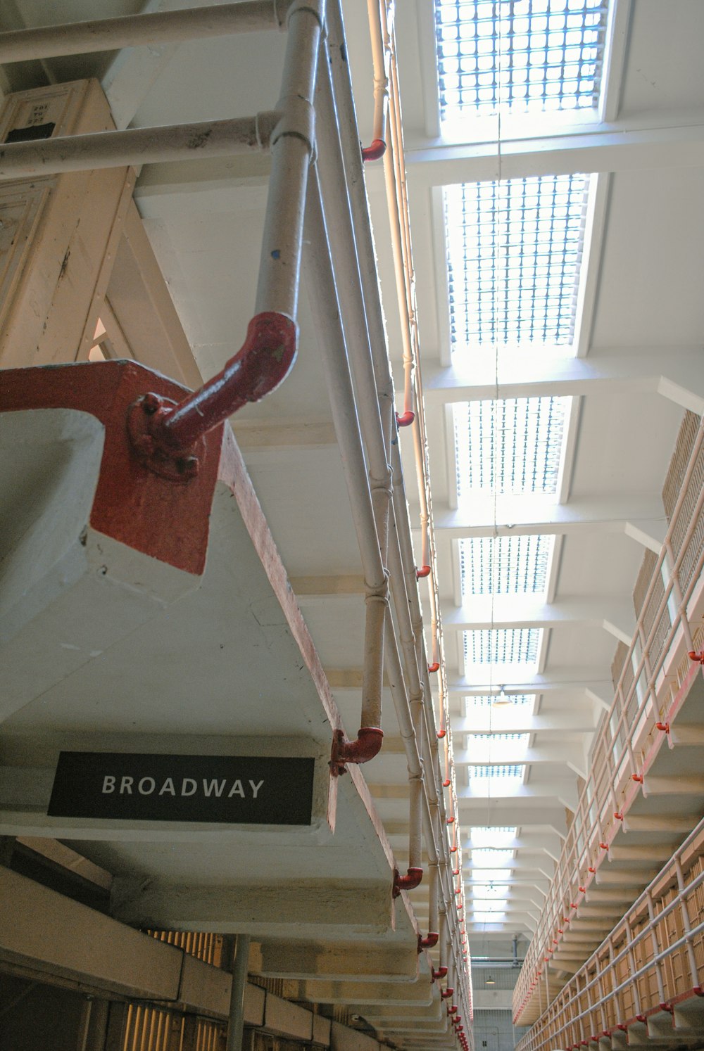 a long hallway with a sign that says broadway