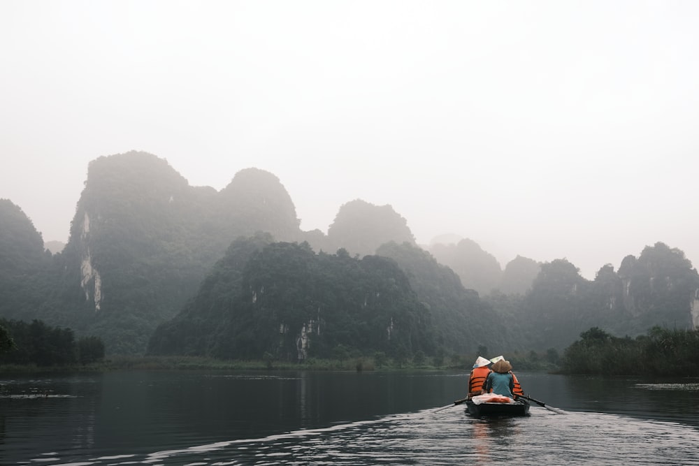 a person in a boat on a body of water