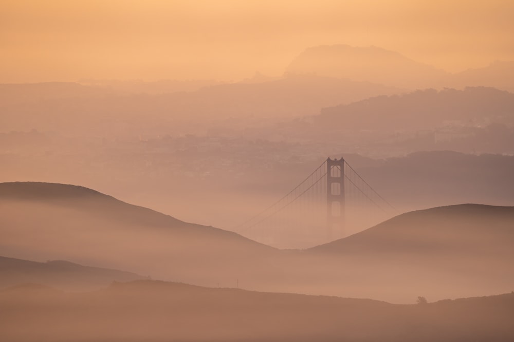 a foggy view of the golden gate bridge