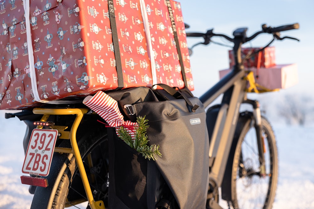 a bicycle with presents on the back of it