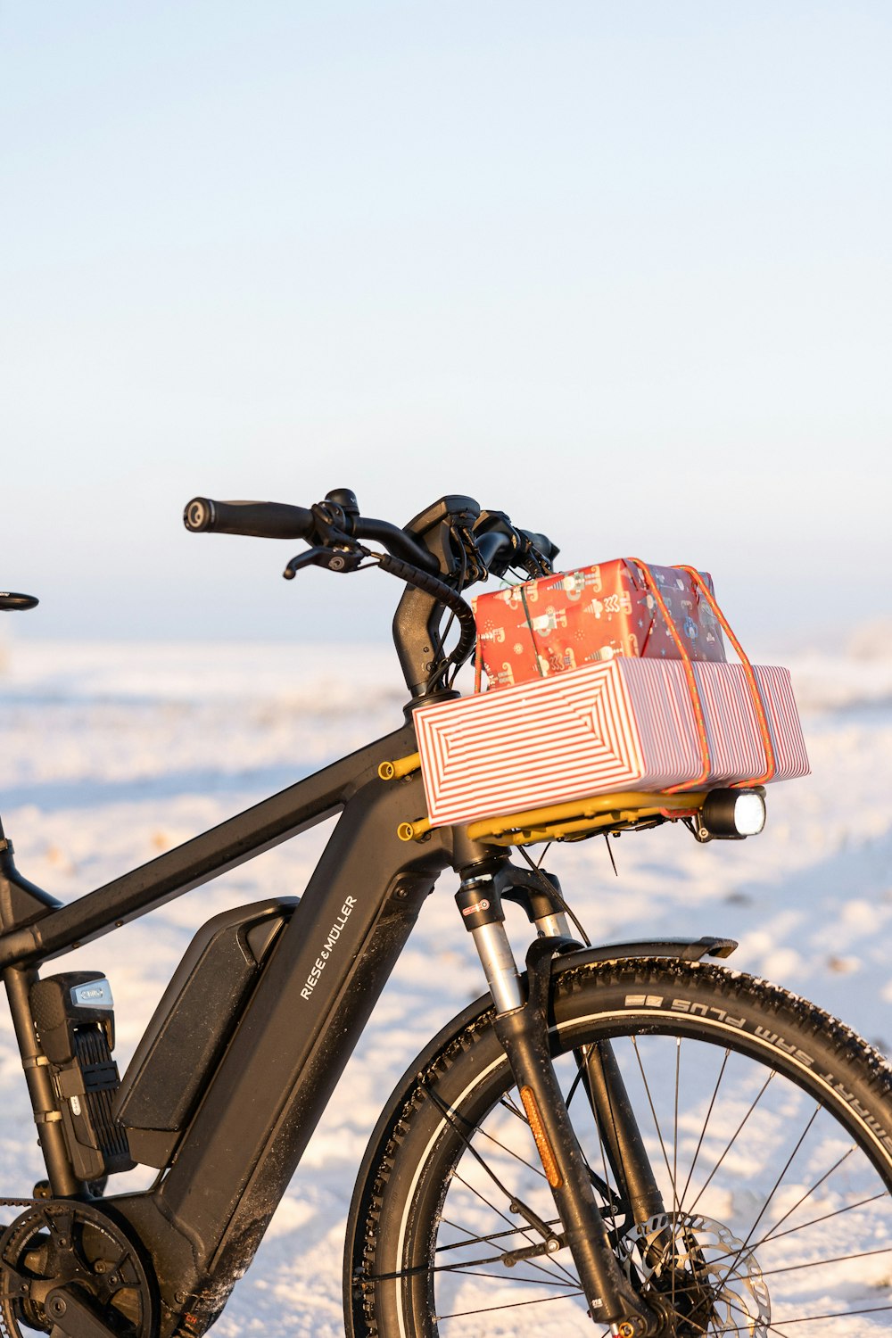 a bicycle with a basket on the back of it