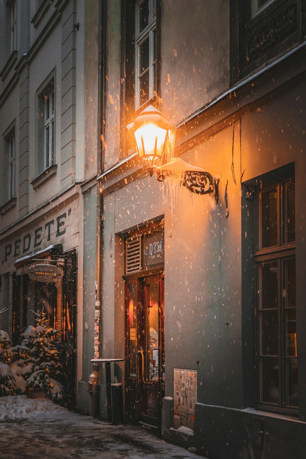 a street light on the side of a building