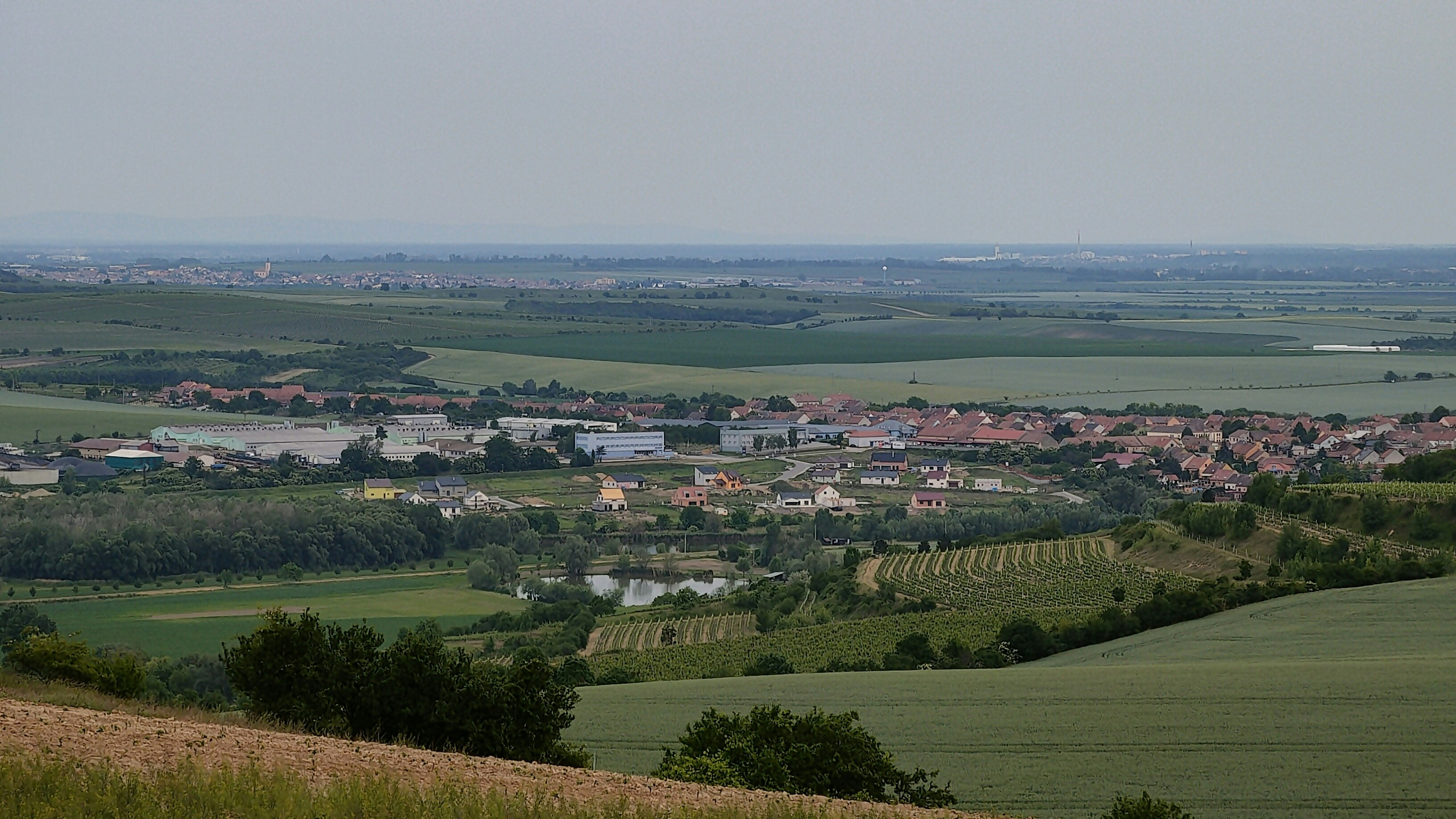 a view of a small town from a hill