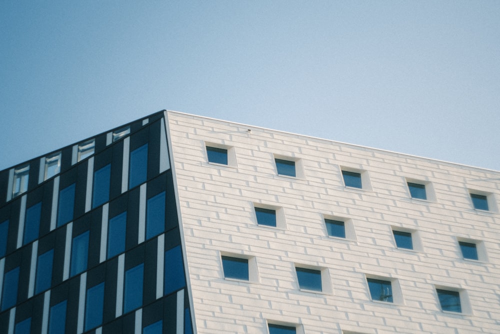 a tall building with a clock on the side of it