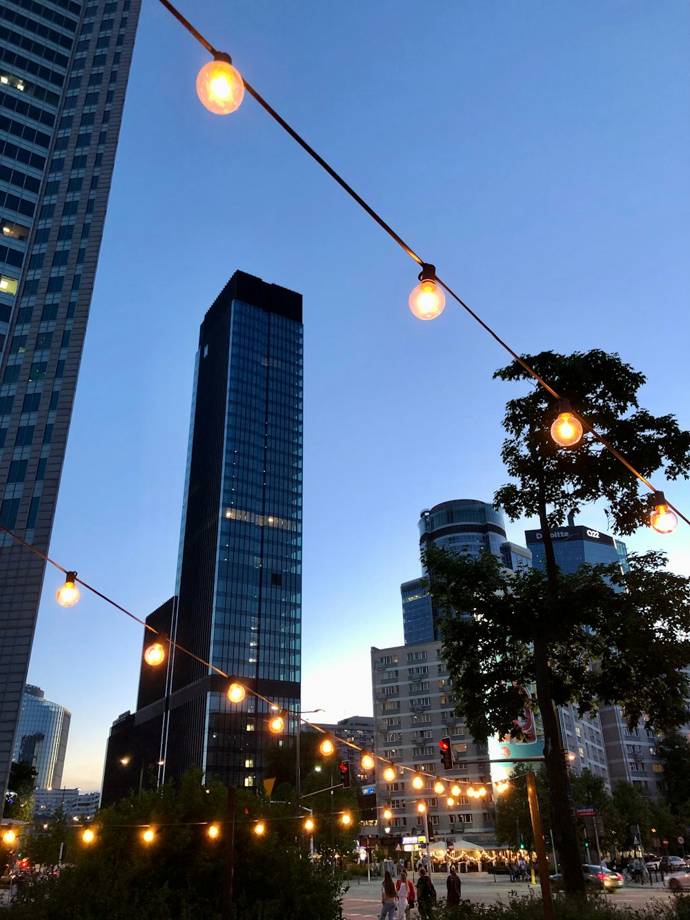 a city street filled with lots of tall buildings