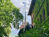 A serene view of the church building surrounded by nature.