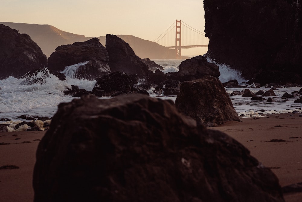 a view of the golden gate bridge from the beach