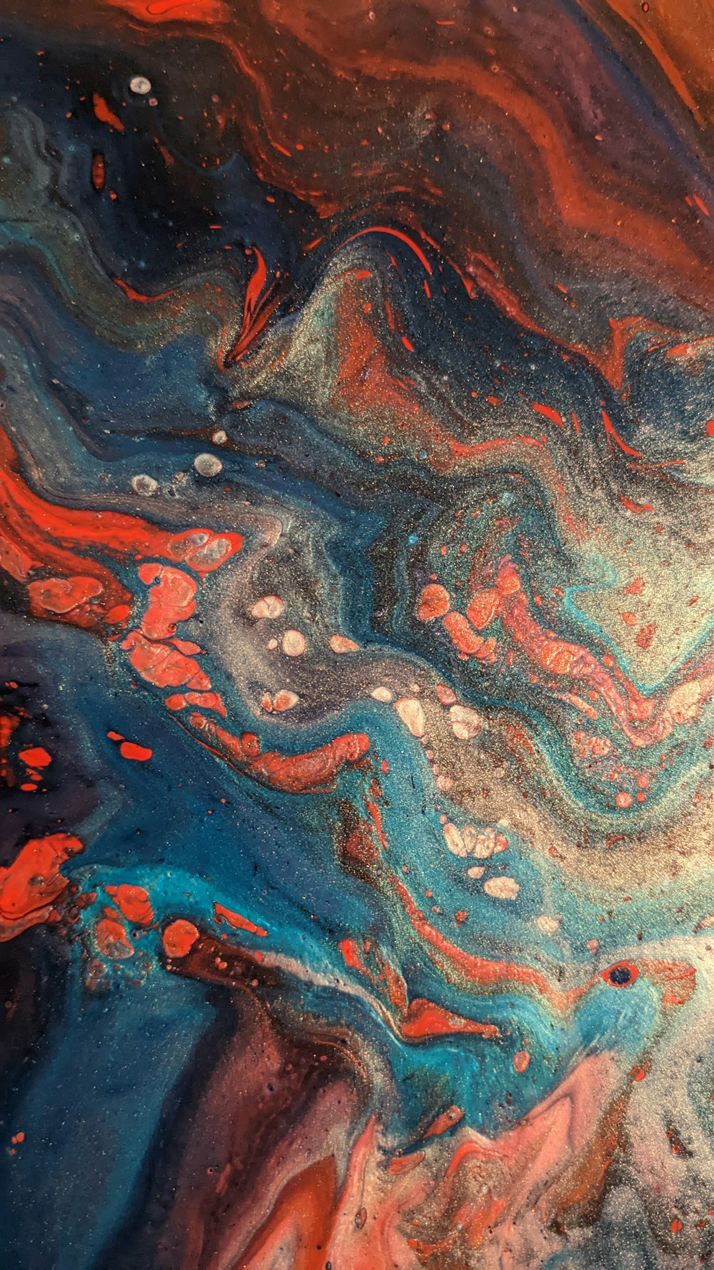 a close up view of a colorful substance