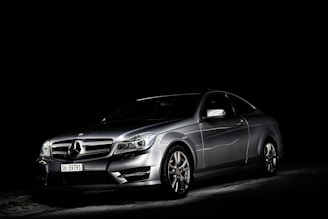 Elegant Mercedes-Benz with metallic finish showcased on a dark background