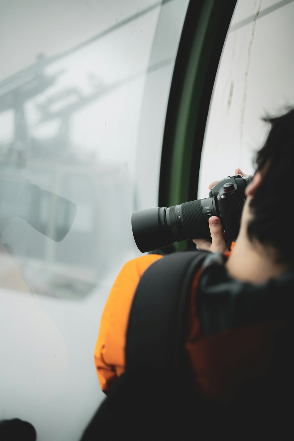 a man taking a picture of himself with a camera