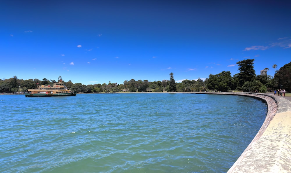 a large body of water surrounded by trees