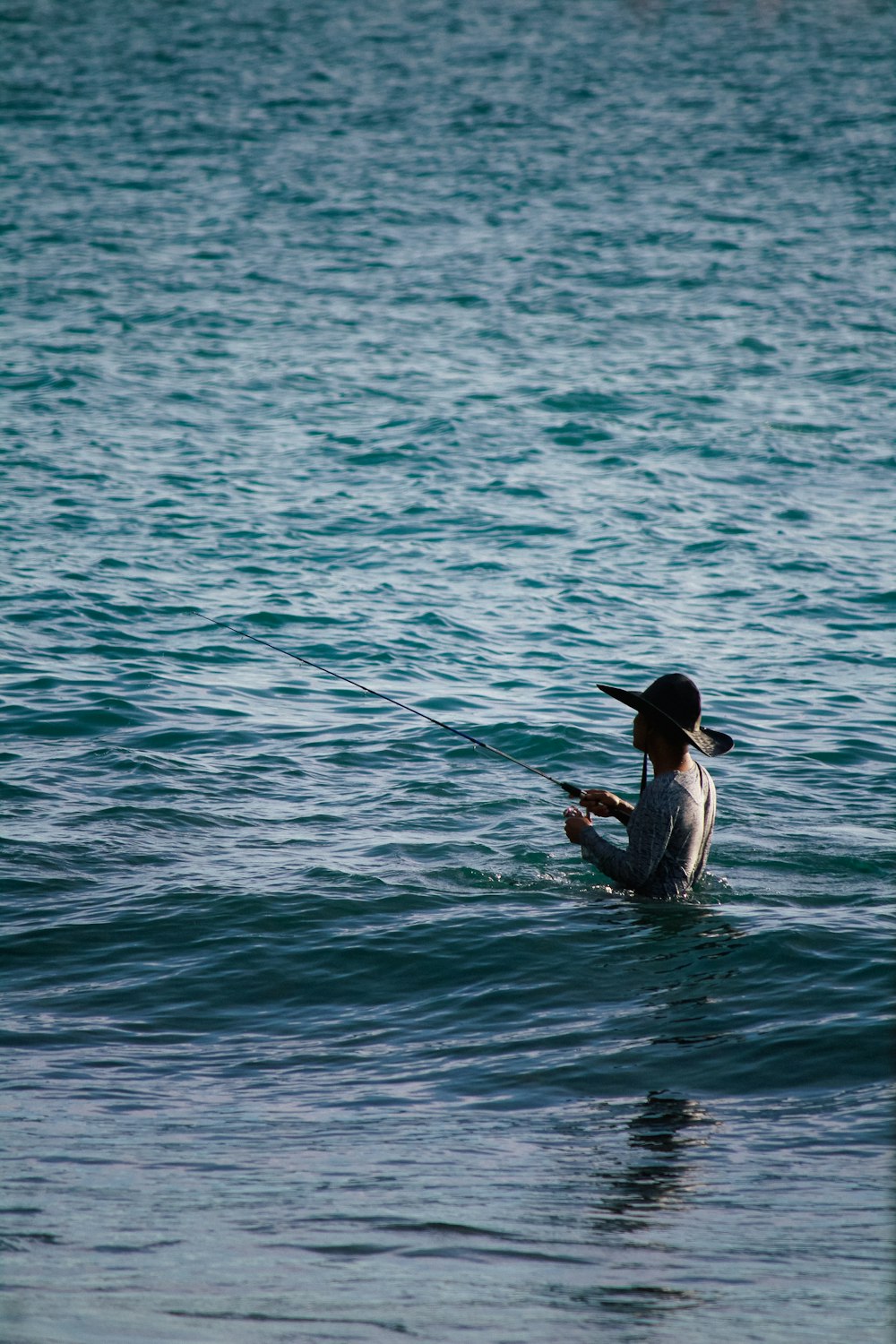 a person on a surfboard in the water