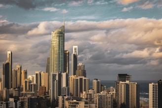 a very tall building towering over a city