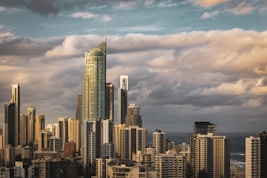 a very tall building towering over a city