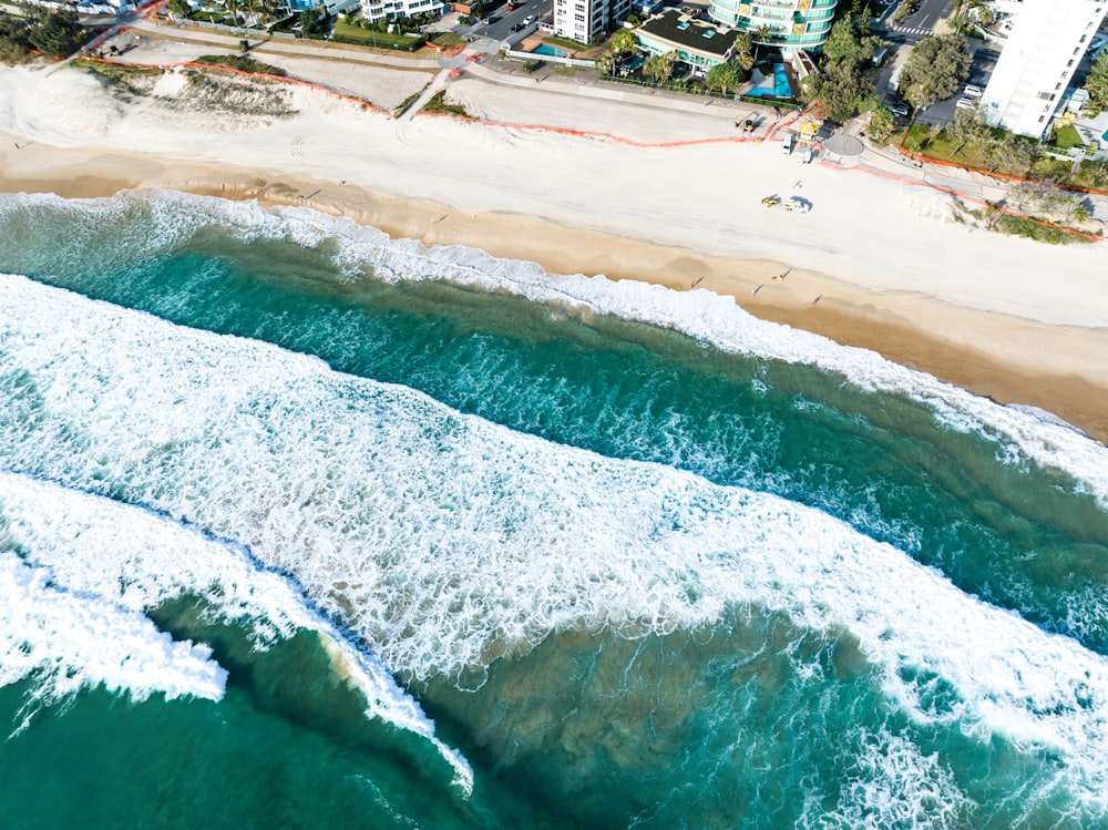 an aerial view of a beach and ocean