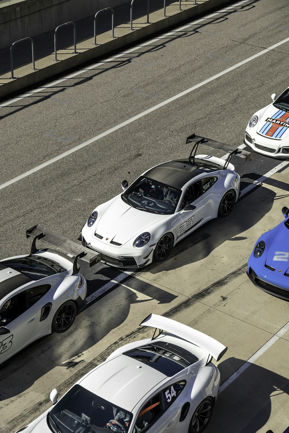 a group of cars parked on the side of a road