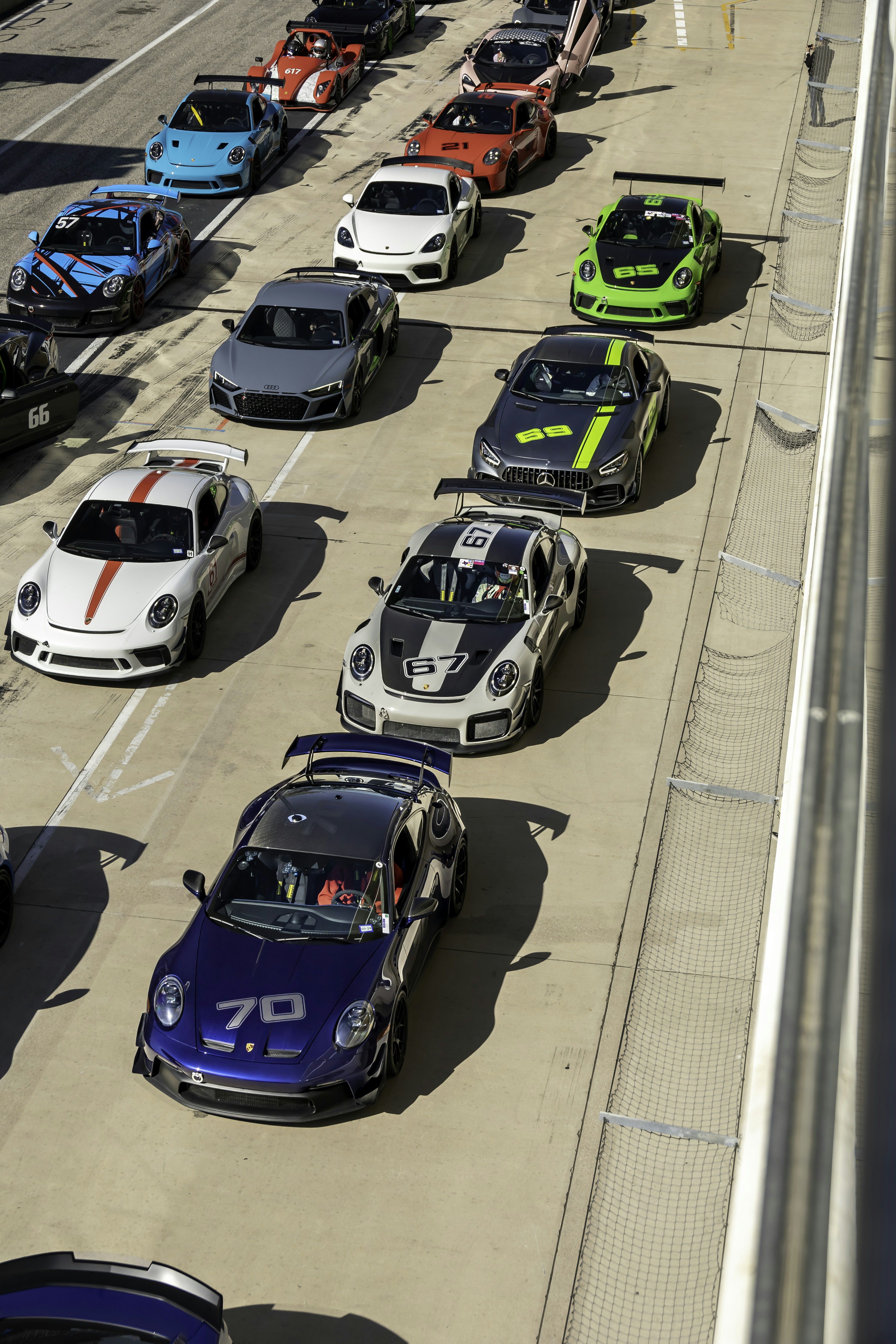 A group of cars that are sitting in the street photo – Free Cota Image ...
