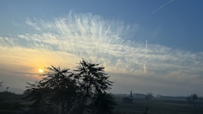 A serene landscape showcasing a peaceful sunrise.